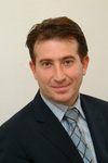 Dr. Simon András